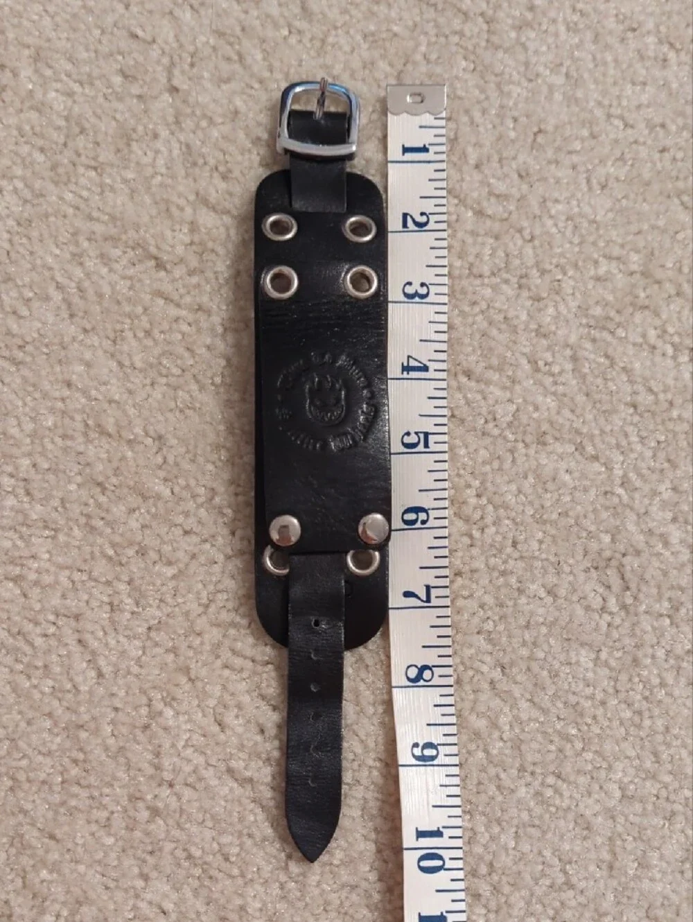 Vintage Black Leather Strap Watch with Red Spitfire Flame Logo